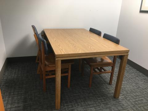 room with table and four chairs